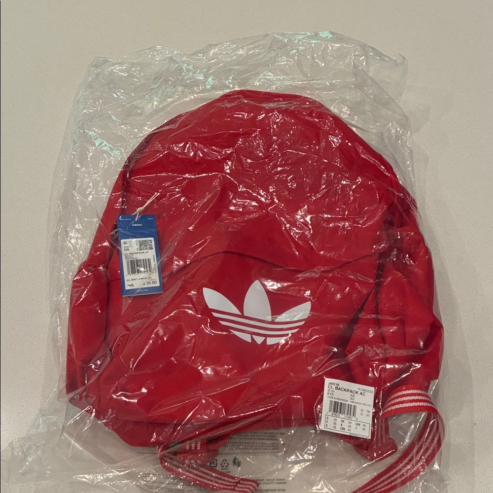 Brand new Adidas backpack. Red.